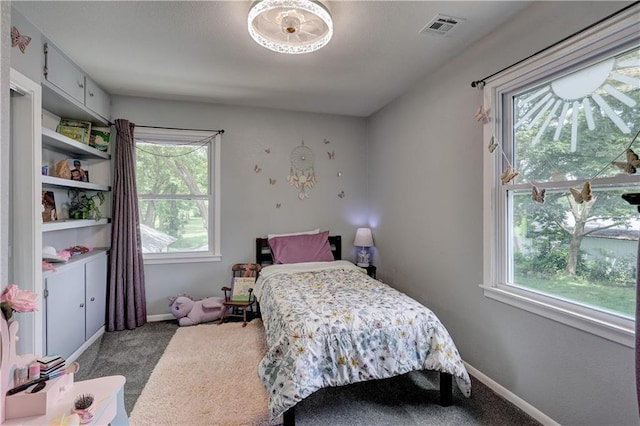 2509 E 4th St, Pittsburg, KS 66762 - carpeted bedroom with multiple windows
