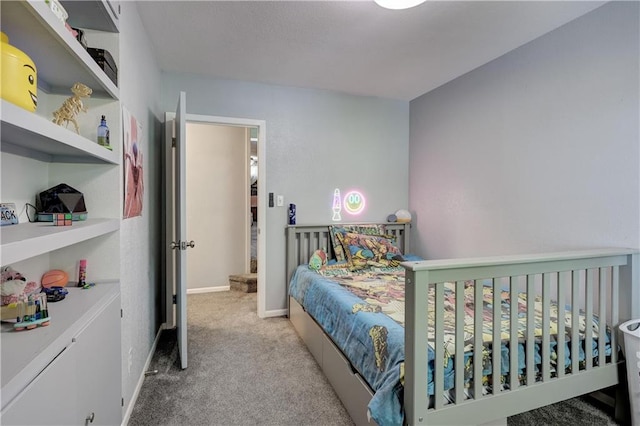 2509 E 4th St, Pittsburg, KS 66762 - carpeted bedroom featuring baseboards
