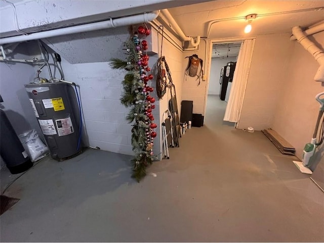 2509 E 4th St, Pittsburg, KS 66762 - unfinished basement with electric water heater and concrete block wall