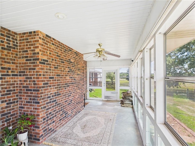 529 SE Dd Hwy, Warrensburg, MO 64093 - unfurnished sunroom featuring a ceiling fan