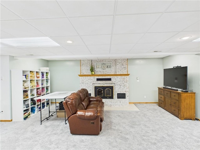 529 SE Dd Hwy, Warrensburg, MO 64093 - living area with carpet flooring, a fireplace with flush hearth, and recessed lighting