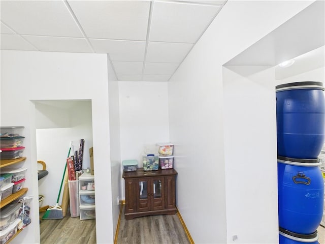529 SE Dd Hwy, Warrensburg, MO 64093 - hall with wood finished floors and a drop ceiling