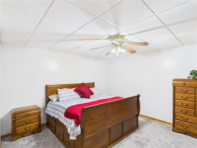 529 SE Dd Hwy, Warrensburg, MO 64093 - bedroom with a drop ceiling, carpet flooring, and a ceiling fan