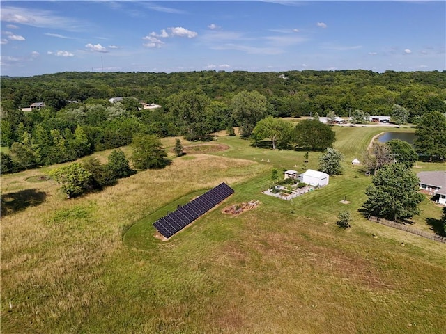 529 SE Dd Hwy, Warrensburg, MO 64093 - drone / aerial view of a heavily wooded area