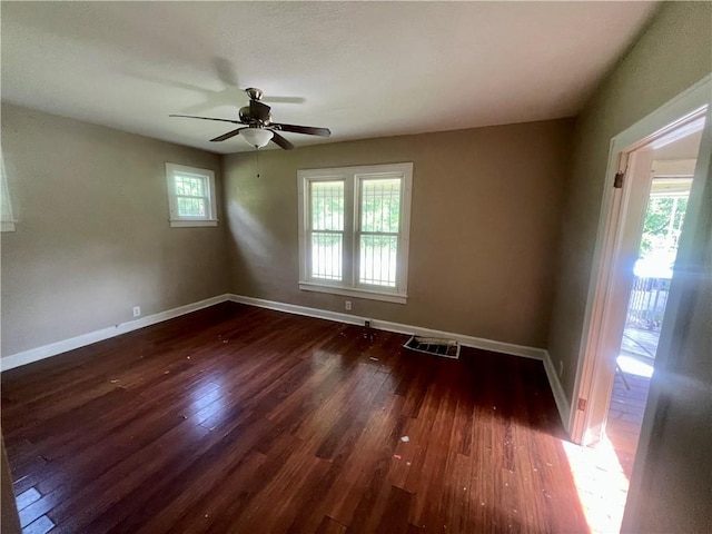 707 Georgia Ave, Kansas City, KS 66101 - spare room featuring wood finished floors and a ceiling fan