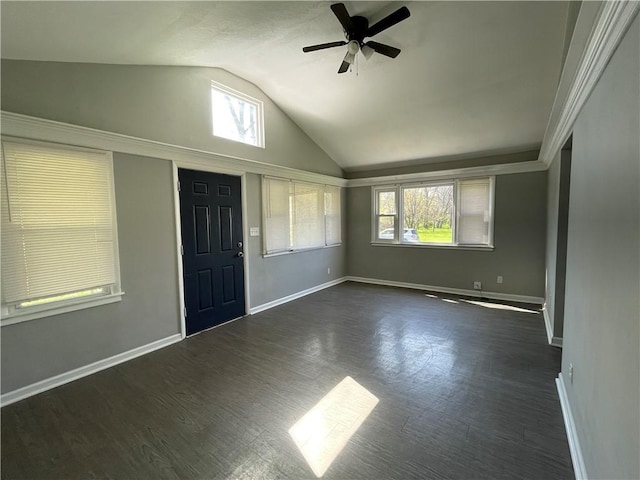 13508 E Silver Ln, Independence, MO 64050 - entryway featuring vaulted ceiling, healthy amount of natural light, a ceiling fan, and dark wood-style flooring