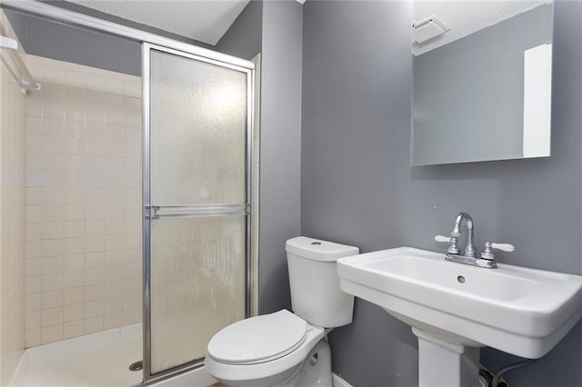 14011 Dunbar Ct, Grandview, MO 64030 - bathroom with a textured ceiling and a stall shower