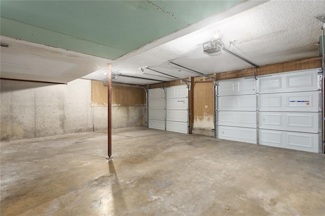 14011 Dunbar Ct, Grandview, MO 64030 - garage with a garage door opener