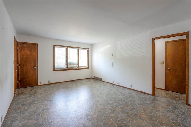 462 W 104th St Unit A, Kansas City, MO 64114 - empty room featuring stone flooring