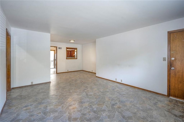 462 W 104th St Unit A, Kansas City, MO 64114 - spare room with stone floors and baseboards