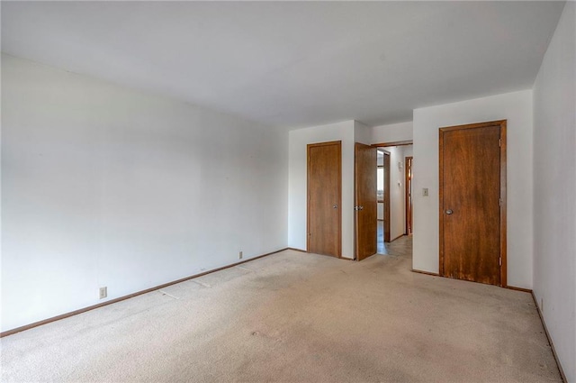462 W 104th St Unit A, Kansas City, MO 64114 - unfurnished bedroom with light colored carpet