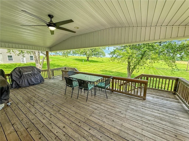 26240 Lakeview Dr, Maryville, MO 64468 - wooden deck with outdoor dining area, grilling area, a lawn, and a ceiling fan