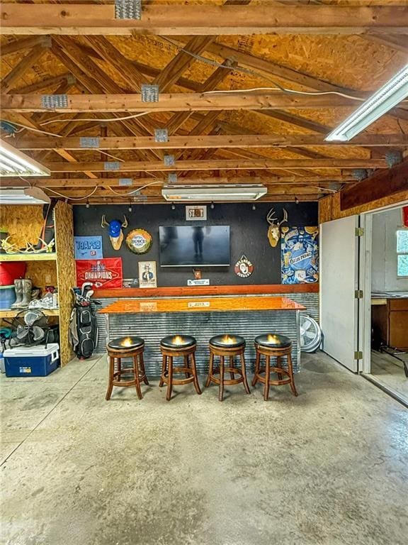 26240 Lakeview Dr, Maryville, MO 64468 - indoor dry bar with concrete floors