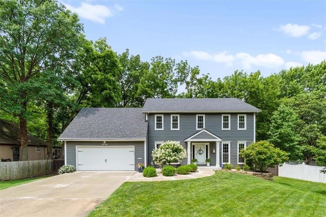 6710 Broadmoor St, Overland Park, KS 66204 - colonial-style house with driveway and an attached garage
