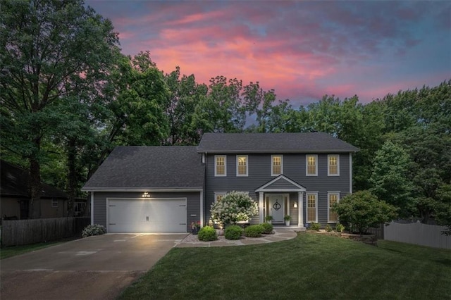 6710 Broadmoor St, Overland Park, KS 66204 - colonial home featuring driveway and a garage