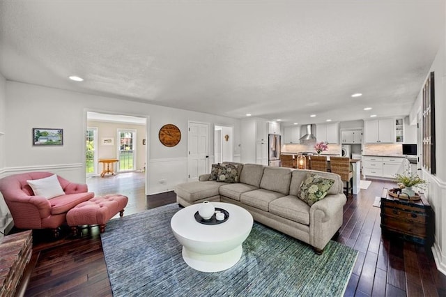 6710 Broadmoor St, Overland Park, KS 66204 - living room featuring recessed lighting, a textured ceiling, and dark wood finished floors