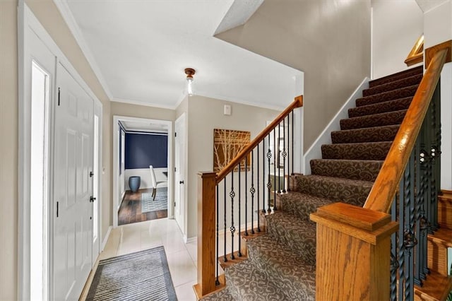 6710 Broadmoor St, Overland Park, KS 66204 - tiled entryway featuring stairs and ornamental molding
