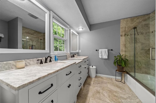 6710 Broadmoor St, Overland Park, KS 66204 - full bathroom featuring double vanity, tiled shower / bath combo, and stone finish flooring