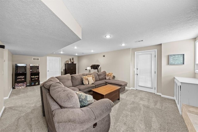 6710 Broadmoor St, Overland Park, KS 66204 - living area with light carpet, a textured ceiling, and recessed lighting