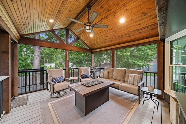 6710 Broadmoor St, Overland Park, KS 66204 - sunroom / solarium featuring an outdoor living space with a fire pit, ceiling fan, and vaulted ceiling