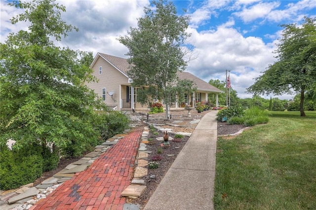 23708 S Southcrest Dr, Peculiar, MO 64078 - view of front of house featuring a front yard and a porch