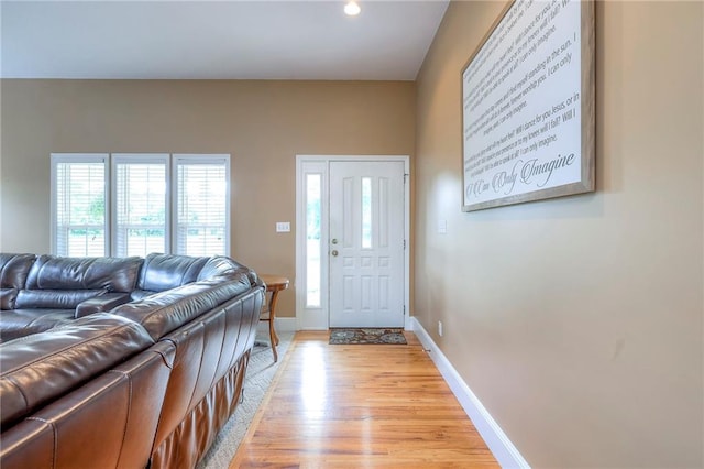 23708 S Southcrest Dr, Peculiar, MO 64078 - entrance foyer with healthy amount of natural light and light wood-style flooring