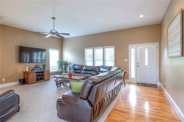 23708 S Southcrest Dr, Peculiar, MO 64078 - living room with ceiling fan, plenty of natural light, light wood-style flooring, and recessed lighting