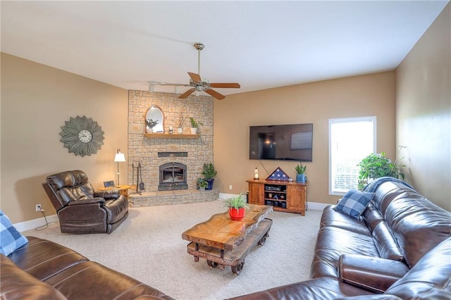 23708 S Southcrest Dr, Peculiar, MO 64078 - living room with carpet, a ceiling fan, and a large fireplace