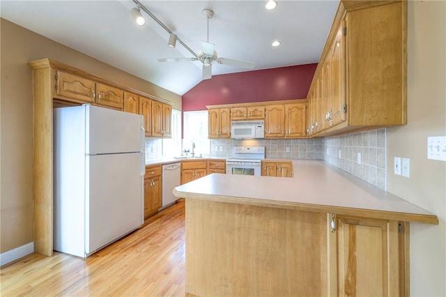 23708 S Southcrest Dr, Peculiar, MO 64078 - kitchen featuring white appliances, vaulted ceiling, a peninsula, light wood-style floors, and ceiling fan