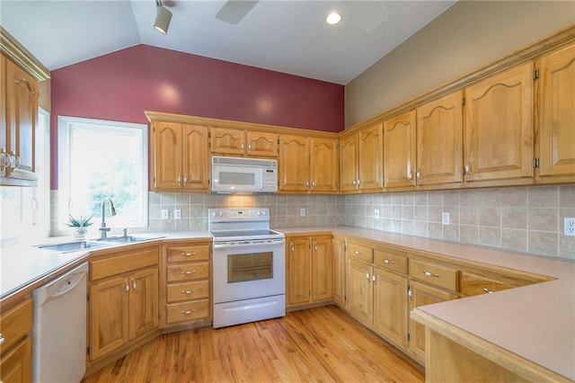 23708 S Southcrest Dr, Peculiar, MO 64078 - kitchen with white appliances, ceiling fan, light countertops, vaulted ceiling, and light wood-style floors