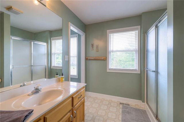 23708 S Southcrest Dr, Peculiar, MO 64078 - bathroom with vanity, an enclosed shower, and tile patterned floors
