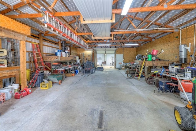 23708 S Southcrest Dr, Peculiar, MO 64078 - garage featuring a central vacuum unit and a workshop area