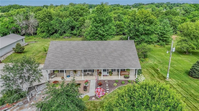 23708 S Southcrest Dr, Peculiar, MO 64078 - aerial view of property and surrounding area featuring a heavily wooded area