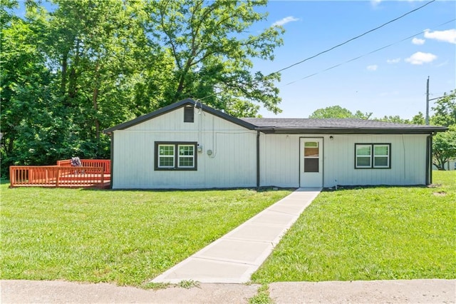 5510 Lafayette Ave, Kansas City, KS 66104 - view of front facade featuring a front yard and a deck