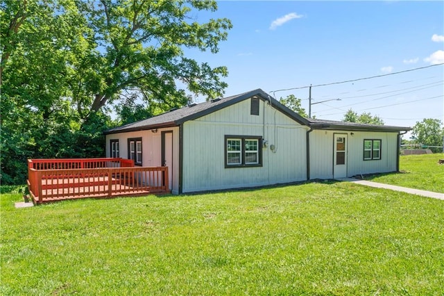 5510 Lafayette Ave, Kansas City, KS 66104 - back of property featuring a yard and a deck
