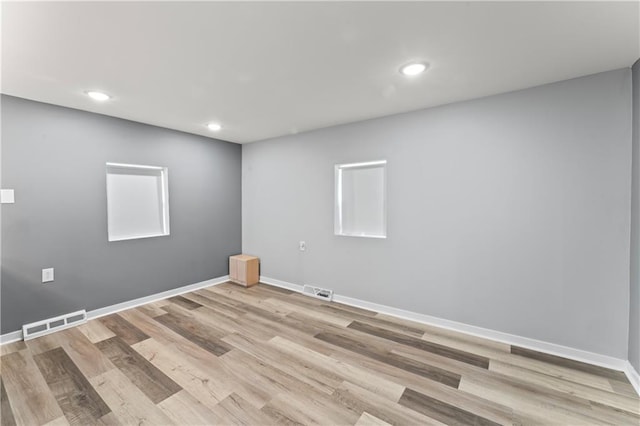5510 Lafayette Ave, Kansas City, KS 66104 - empty room with light wood-style flooring and recessed lighting