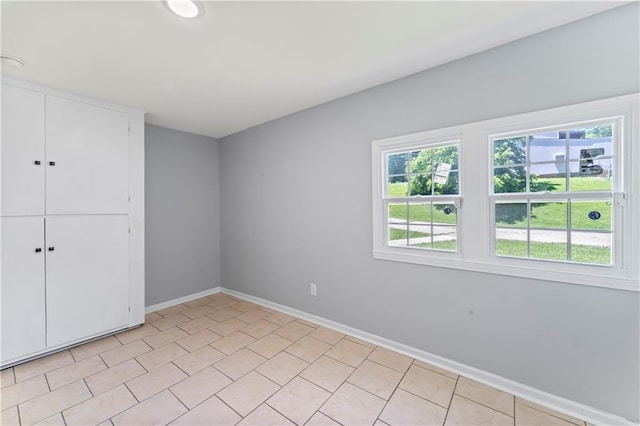 5510 Lafayette Ave, Kansas City, KS 66104 - unfurnished bedroom with baseboards and a closet