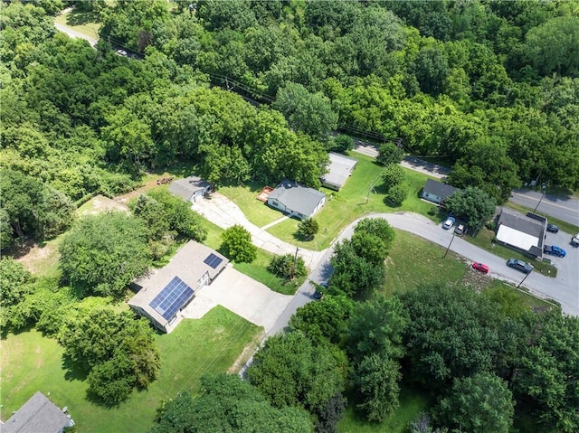 5510 Lafayette Ave, Kansas City, KS 66104 - aerial view of property and surrounding area featuring a heavily wooded area