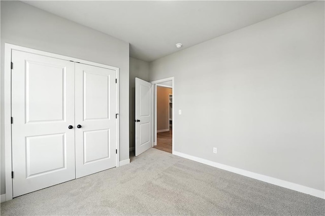 3319 N 109th Ter, Kansas City, KS 66109 - unfurnished bedroom featuring carpet floors and a closet