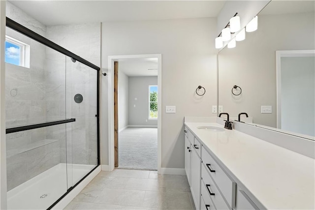 3319 N 109th Ter, Kansas City, KS 66109 - full bath with vanity, a stall shower, and tile patterned flooring
