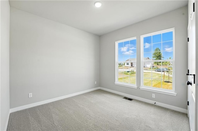 3319 N 109th Ter, Kansas City, KS 66109 - carpeted spare room featuring baseboards