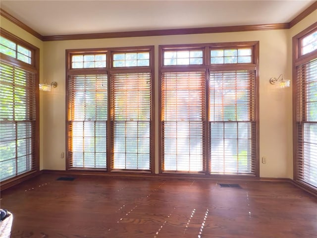 13009 Fontana St, Leawood, KS 66209 - doorway with crown molding and wood finished floors