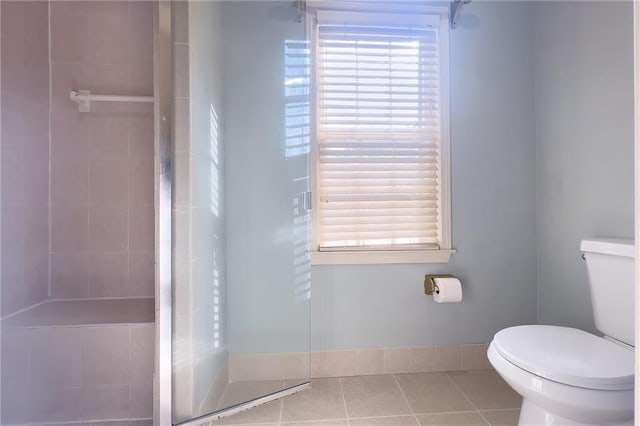 13009 Fontana St, Leawood, KS 66209 - bathroom with tiled shower and tile patterned floors