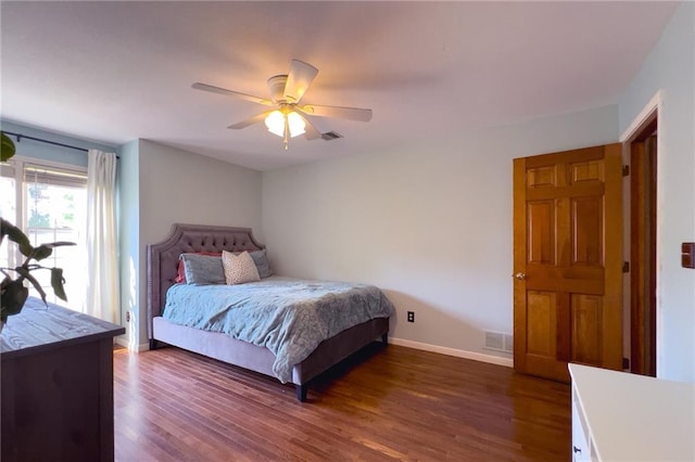 13009 Fontana St, Leawood, KS 66209 - bedroom with dark wood finished floors and ceiling fan