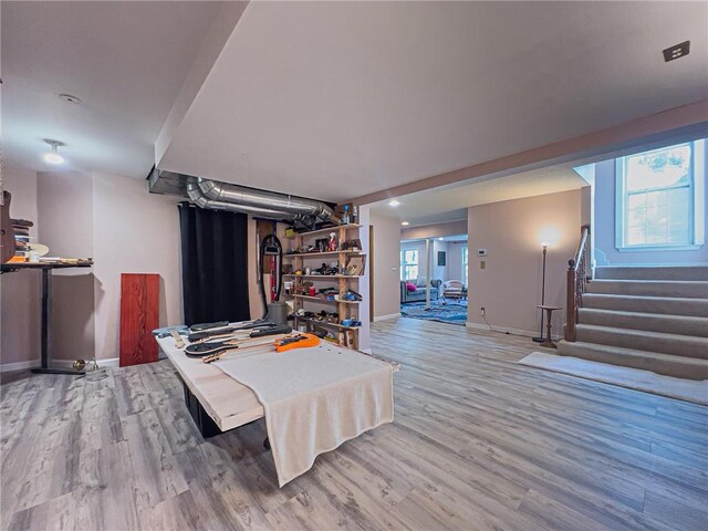 13009 Fontana St, Leawood, KS 66209 - living area with wood finished floors and stairway