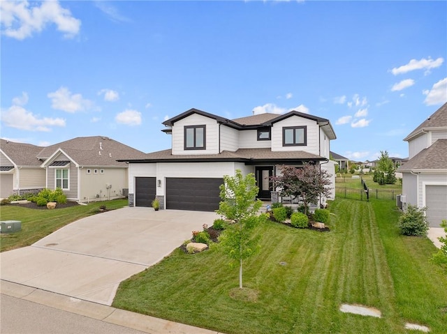 15297 W 172nd Pl, Olathe, KS 66062 - view of front facade featuring concrete driveway, an attached garage, and roof with shingles