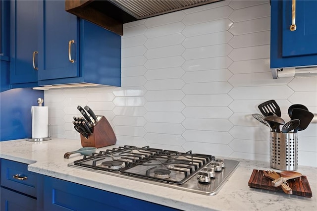15297 W 172nd Pl, Olathe, KS 66062 - kitchen featuring blue cabinetry, stainless steel gas stovetop, backsplash, and custom range hood