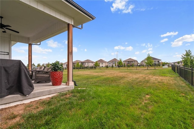 15297 W 172nd Pl, Olathe, KS 66062 - view of yard with a ceiling fan and a residential view