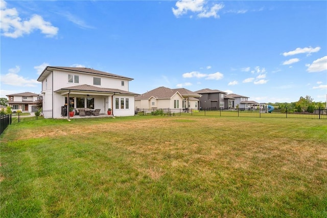 15297 W 172nd Pl, Olathe, KS 66062 - back of house with a patio, a fenced backyard, and a ceiling fan