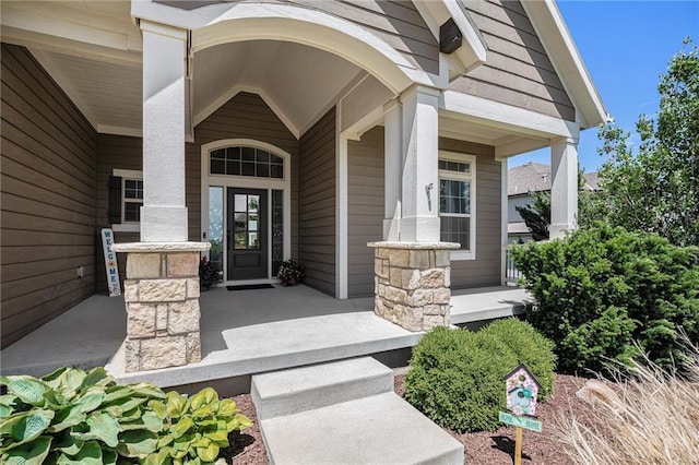 25072 W 114th Ct, Olathe, KS 66061 - doorway to property featuring covered porch